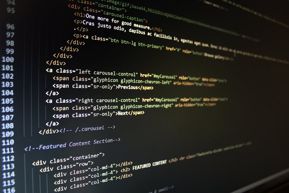 The image displays a close-up view of a computer screen with lines of color-coded programming code on a dark background, including syntax highlighting with green, yellow, white, red, and blue elements